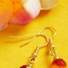 Ohrringe aus Rudraksha und Glas