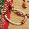 Schmuck-Set aus Knochen- und Glasperlen