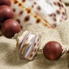 Armband aus Kaurischnecken- und Holzperlen