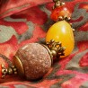Armband Kalimba, Nahaufnahme einer Lavakugel und eines Orangencalcit-Nugget