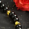 Schmuck-Set Lichter der Großstadt, Nahaufnahme der Onyx-Rondelle und Bernstein-Nuggets