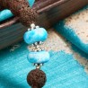 Halskette Kilauea, Nahaufnahme der Lava- und Polymer Clay-Perlen, mit silberfarbenen Metallspacern