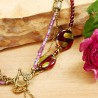 Halskette aus Metall und Glas