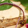 Halskette aus Metall und Glas